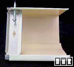 Here is a close-up of a hidden hanger and screw, in an almond painted aluminum gutter 