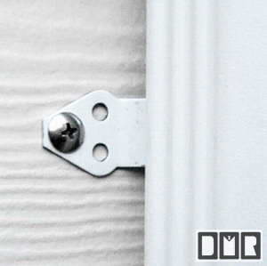 Here is a close-up of a hidden hanger and screw, in an almond painted aluminum gutter 