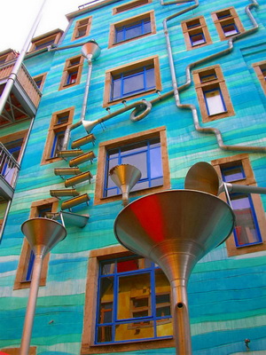 Wall mount rain-cups
